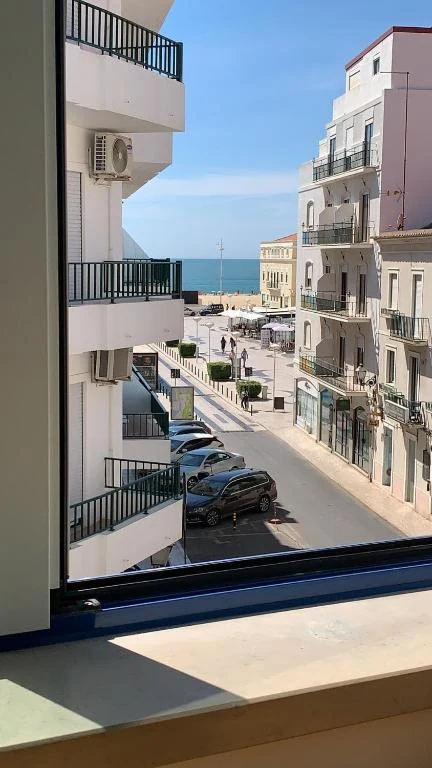 A view towards the sea and the streets of Nazaré from WEAA Hotel